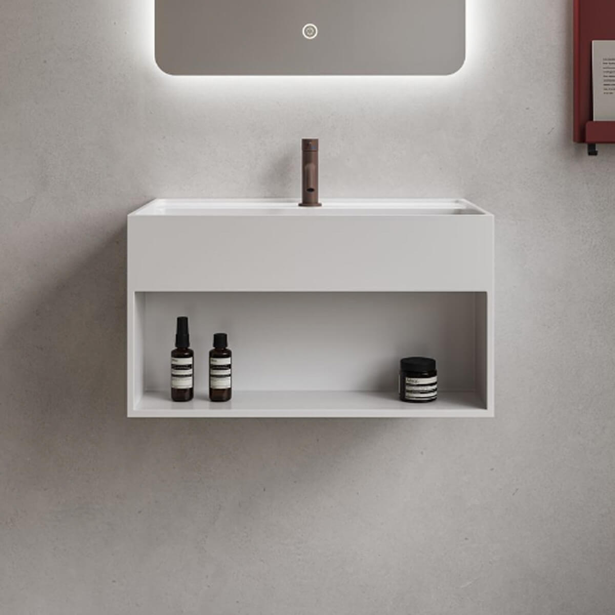 Matte white wall hung bathroom wash basin with a large shelf